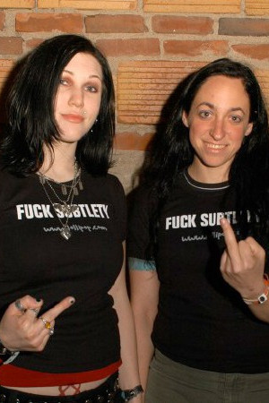 Marta of Bleeding Through and Rachel of Most Precious Blood sport their Fuck Subtlety shirts at the New England Metal and Hardcore Festival | Photo by Carina Mastrocola
