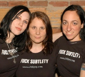 Marta of Bleeding Through, Carina of DefyUnlearn.com, and Rachel of Most Precious Blood sport their Fuck Subtlety shirts at the New England Metal and Hardcore Festival | Photo by Carina Mastrocola