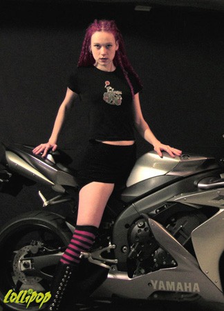Jennifer poses in her Frolicking Foamies shirt with a few of her favorite things.