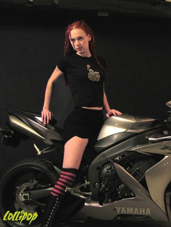 Jennifer poses in her Frolicking Foamies shirt with a few of her favorite things.