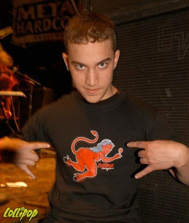 A suave Devil shows his horns in a SheDevil Doggy tee at the New England Metalfest. | Photo by Carina Mastrocola