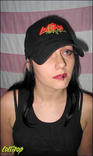 Manda in her Lollipop hat. Man, her eyes are redder than the stripes on that flag. Check out Manda in the Models section. | Photo by Bruce Bettis