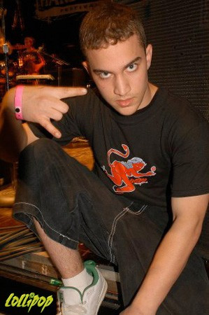 A suave Devil shows his horns in a SheDevil Doggy tee at the New England Metalfest. | Photo by Carina Mastrocola