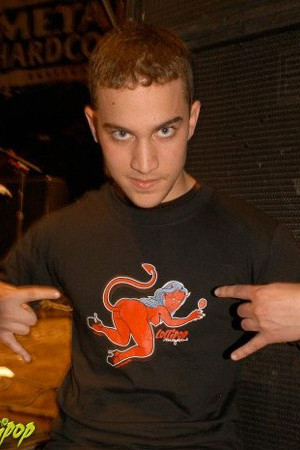 A suave Devil shows his horns in a SheDevil Doggy tee at the New England Metalfest. | Photo by Carina Mastrocola